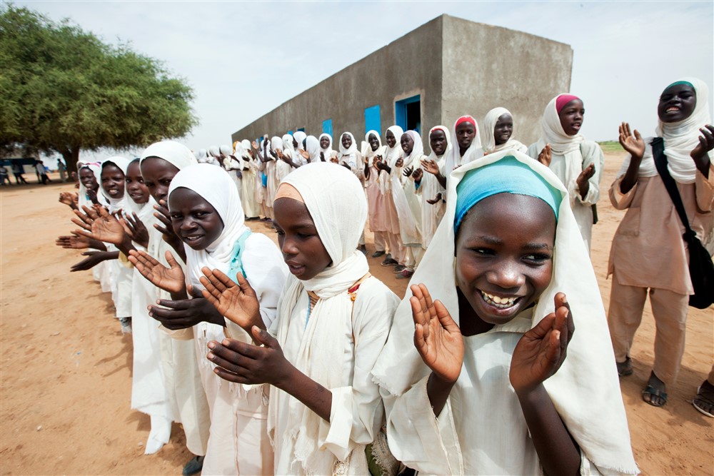 Girls in Kuma Garadayat, North Darfur, celebrate the inauguration of their new school. Photo by Albert González Farran - UNAMID